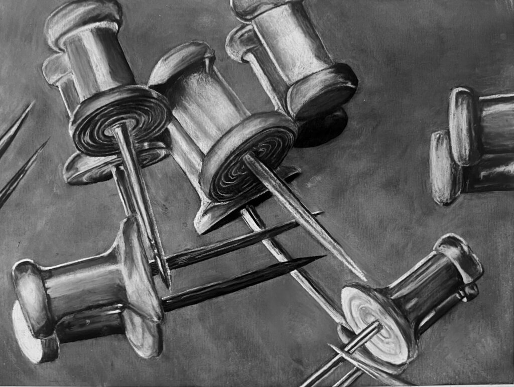 Charcoal drawing of several pushpins.