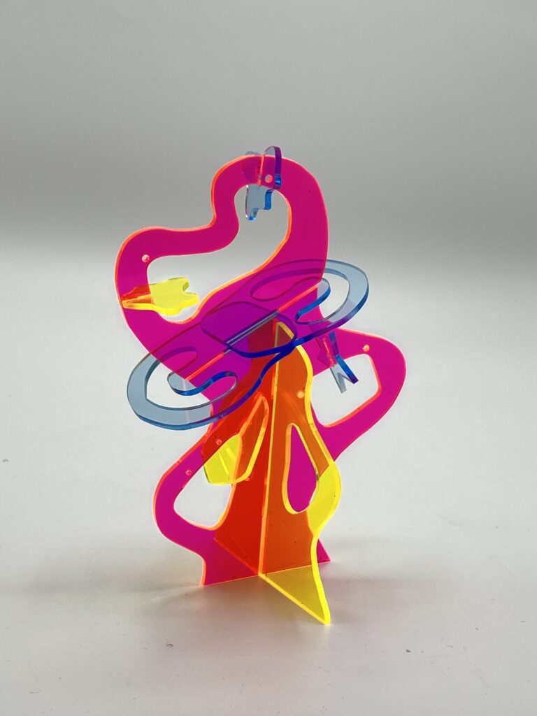 Acrylic sculpture made up of interlocking, thin, and wavy-shaped pieces.
