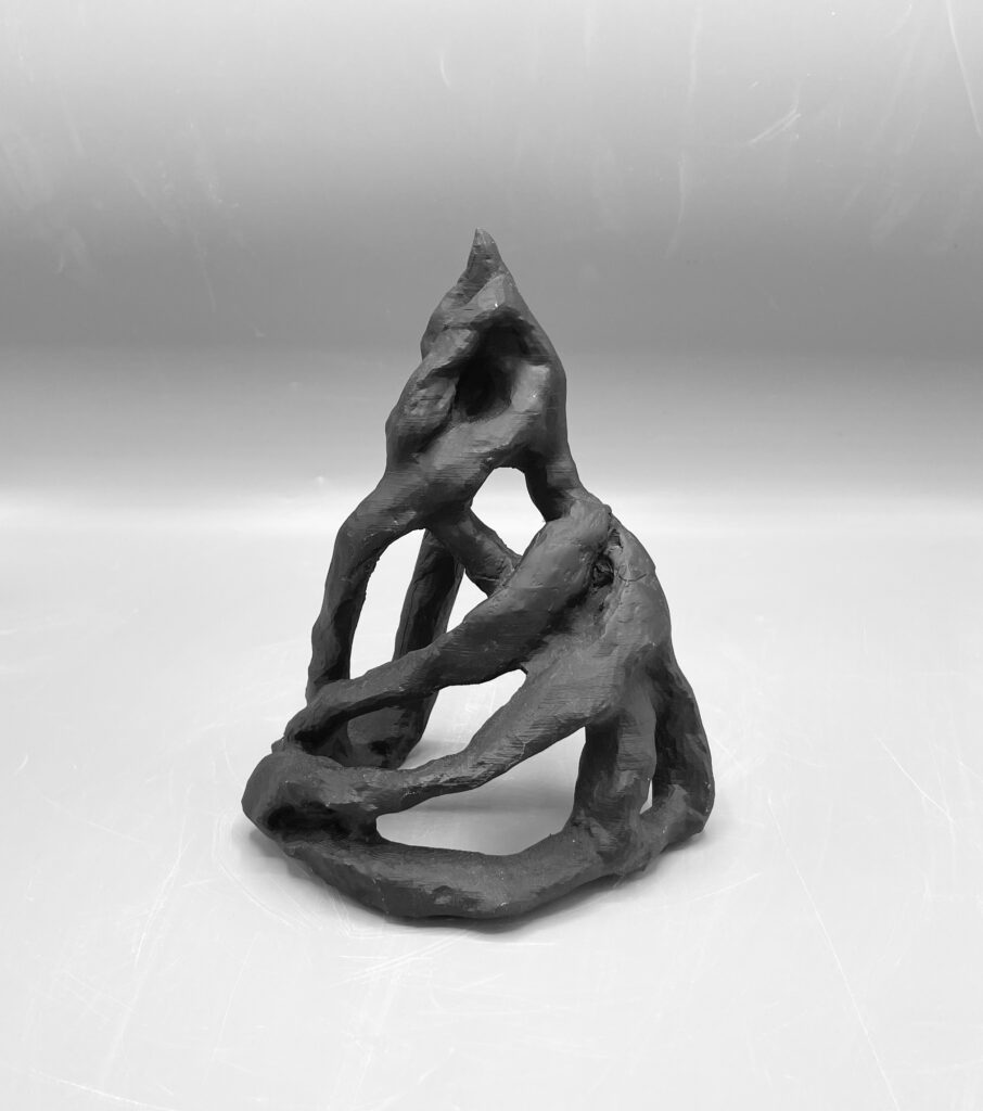 Sculpture of twisting shapes, forming a cone shape as a whole.